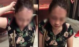 Bị bắt gặp khi đang tình tứ với chồng người khác trên ô tô, cô bồ nhí vẫn thản nhiên buộc lại tóc, mặc kệ chị vợ gào thét