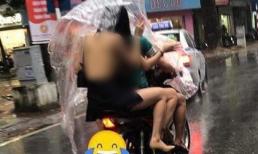Cô gái mặc váy hở toàn bộ lưng, lộ phần nhạy cảm đi ra đường giữa trời mưa khiến dân mạng lắc đầu ngán ngẩm