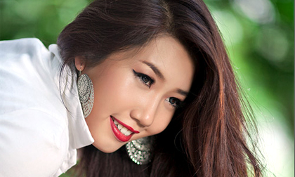 Vì sao Thúy Ngân lùi ngày thi Nữ hoàng Du lịch quốc tế?