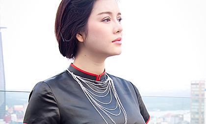 Lý Nhã Kỳ đẹp lạ với áo dài Lãnh Mỹ A của Võ Việt Chung