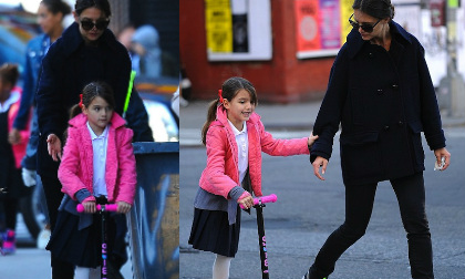 Suri mải mê trượt xe scooter mặc cánh tay đau