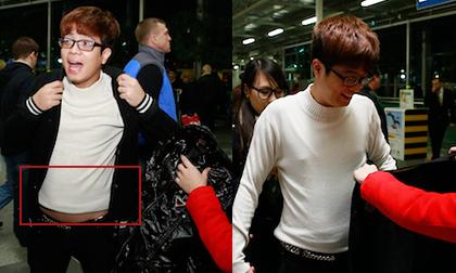 Bùi Anh Tuấn thay áo, để "lộ" bụng béo tròn giữa sân bay Nga