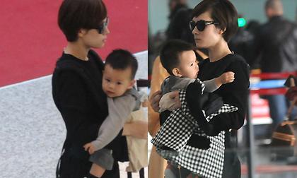 Tôn Lệ mặt lạnh lùng địu con một mình ở sân bay
