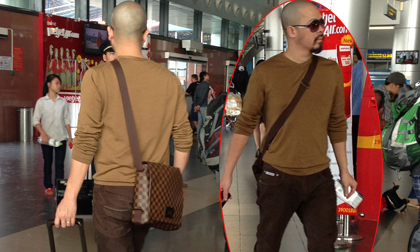 Ngắm style đời thường của NTK Đức Hùng ở sân bay