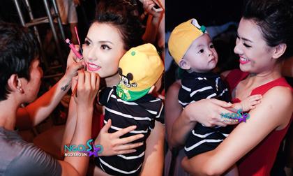 Hồng Quế vừa bế cháu vừa tranh thủ make-up