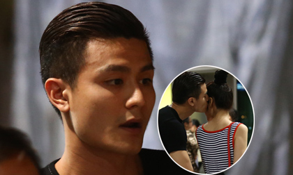 Vĩnh Thụy hôn bạn gái Thu Hằng giữa sân bay