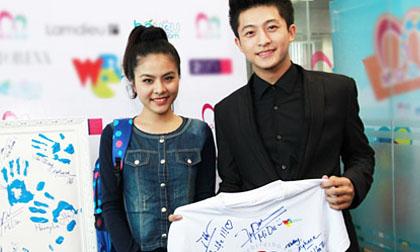 Vân Trang thân mật cùng “trai đẹp” Harry Lu tham gia từ thiện 
