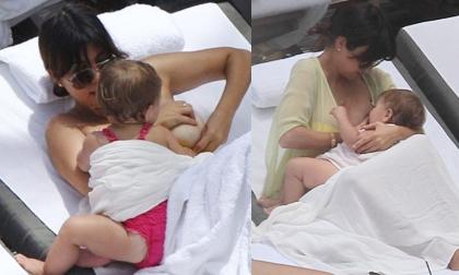 Chị gái Kim ngang nhiên vạch áo cho con bú ở bể bơi