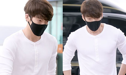 Kim Woo Bin mặc 'chất lừ', đeo khẩu trang kín mít ở sân bay