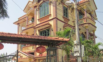 Người đàn bà cụt hai bàn tay xây biệt thự thế nào?