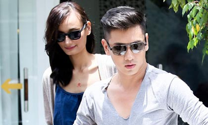 Bạn trai chở Lê Thúy đi chụp ảnh cưới bằng xe máy