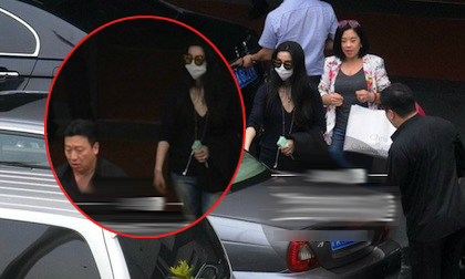 Phạm Băng Băng che kín mít, được 'người tình' đón bằng xế sang