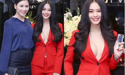 Linh Chi diện vest táo bạo, khoe điện thoại Vertu đắt giá