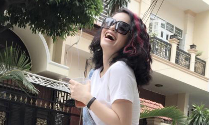 Hồ Kim dạo phố với phong cách 'Xì-tin'