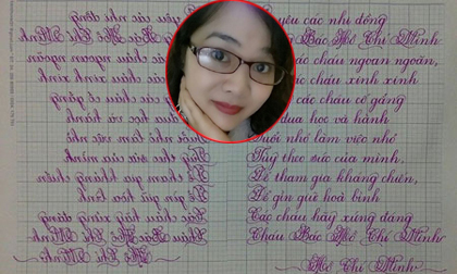 Cô gái có biệt tài viết chữ xoay ngược 180 độ đẹp như in