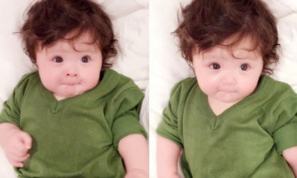 Cadie mím môi, tròn mắt cực đáng yêu