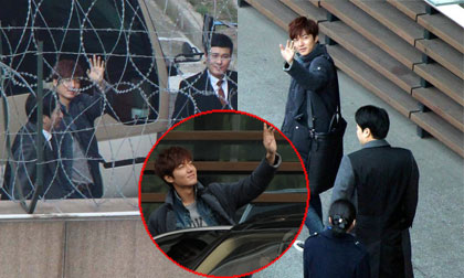 Lee Min Ho được bảo vệ cẩn mật vẫn không quên vẫy tay chào fans