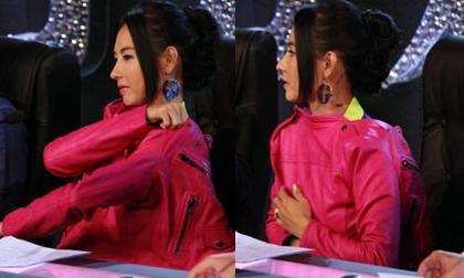 Trương Bá Chi mặc áo ngược, hồn nhiên đặt tay lên vòng một trên sân khấu