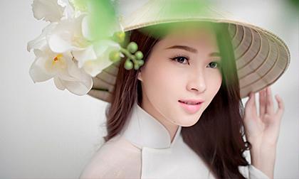 Hoa hậu Thu Thảo đẹp ngọt ngào cùng 12 hương sắc áo dài