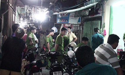 Con giết mẹ, chém anh trai ở chợ Nhật Tảo