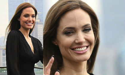 Jolie già nua gầy gò với đầy vết chân chim và tóc bạc