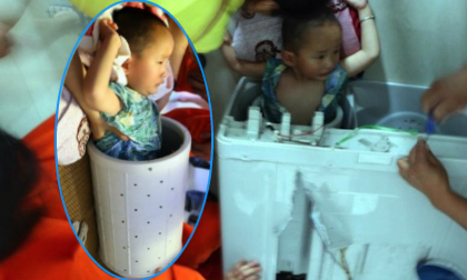 Hy hữu chú bé mắc kẹt trong thùng máy giặt