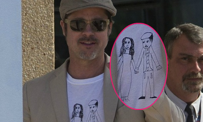 Brad Pitt khoe áo in hình mình và Jolie do con gái vẽ