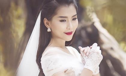 Lan Hương mặc váy cô dâu, khoe vẻ yêu kiều trong rừng