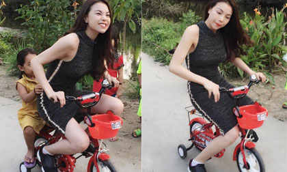 Trà Ngọc Hằng mặc váy đạp xe... ba bánh siêu 'ngầu'