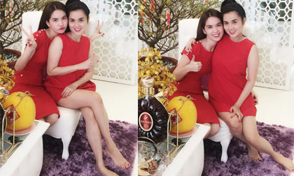 Chị em Ngọc Trinh 'ton sur ton' đỏ rực ngày đầu năm