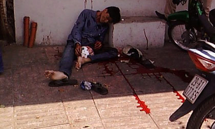 Chán đời, một thanh niên tự cắt cổ giữa phố