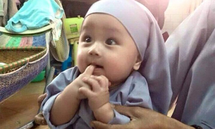 Sự thực vụ em bé xinh như thiên thần bị bỏ rơi gây bão mạng