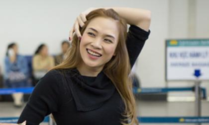 Mỹ Tâm tươi tắn ở sân bay lúc nửa đêm