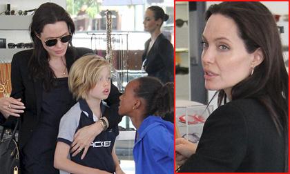 Angelina Jolie mệt mỏi, hốc hác đưa con đi shopping