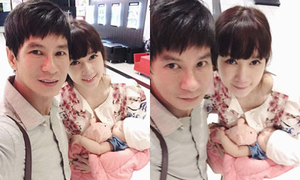 Vợ chồng Lý Hải bế con gái út đi xem phim