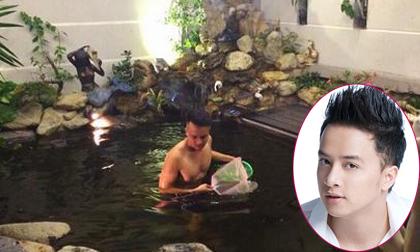 Cao Thái Sơn 'tắm tiên' giữa hồ cá