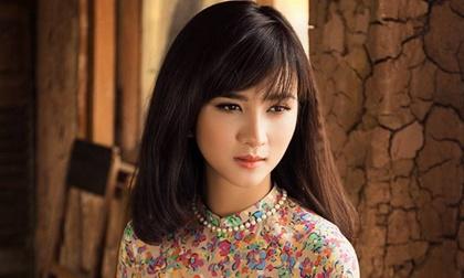Kim Tuyến đẹp mặn mà trong tà áo dài