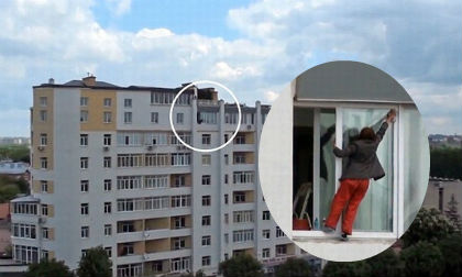 Thót tim với người phụ nữ 'treo mình' trên tầng 9