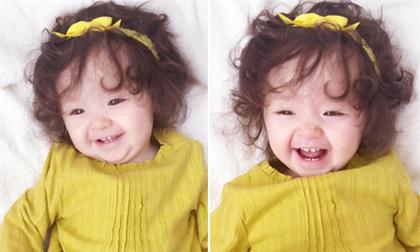 Cadie hớn hở khoe răng sữa cùng nụ cười thiên thần