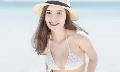 Á hậu Trang sức Hương Giang khoe vẻ căng tràn trước biển