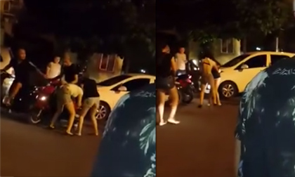 Gái xinh đánh nhau, lột áo trên phố Hà Nội