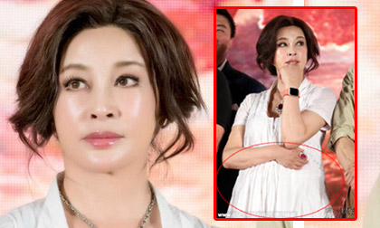 Lưu Hiểu Khánh mặc váy suông rộng như mang bầu