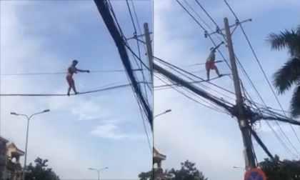 Nam thanh niên đu dây điện ở Sài Gòn như người nhện