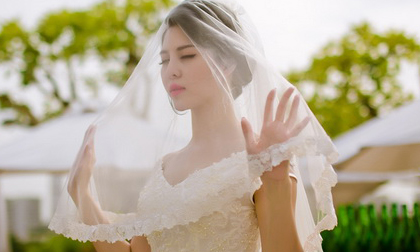 Á hậu Trà Giang diện áo cưới sau tin đồn mang bầu