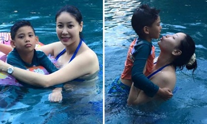 Bà bầu Hà Kiều Anh mặc áo tắm, 'nghịch nước' cùng con trai