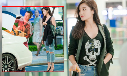 Huyền My ăn diện khỏe khoắn được bố tháp tùng ra sân bay 