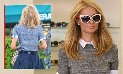 Paris Hilton quên kéo khóa váy vẫn mải mê tạo dáng