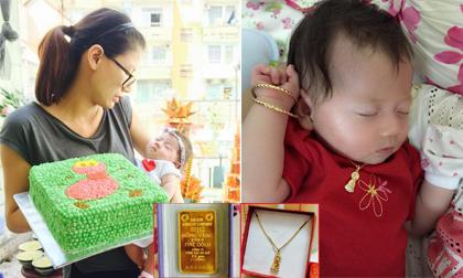 Con gái Trang Trần được 'đắp' vàng trong lễ đầy tháng