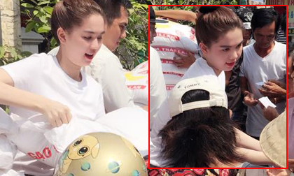 Ngọc Trinh về quê đầu trần 'đội nắng' phát gạo từ thiện