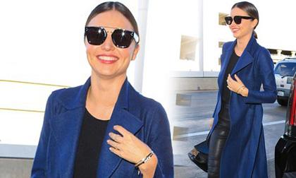 Miranda Kerr lộ mặt 'bánh bao' phúng phính ở sân bay